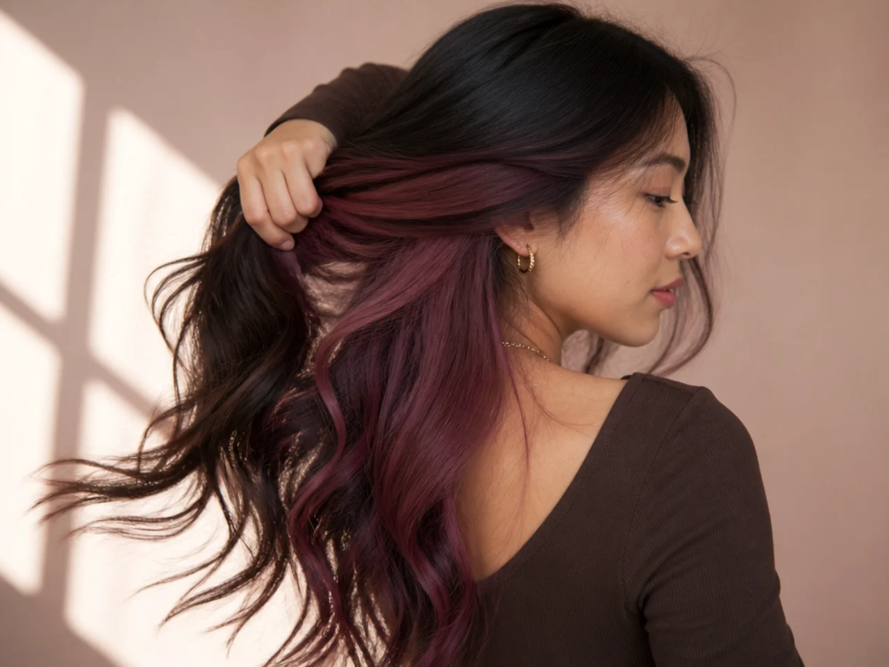A plum panel on brunette hair