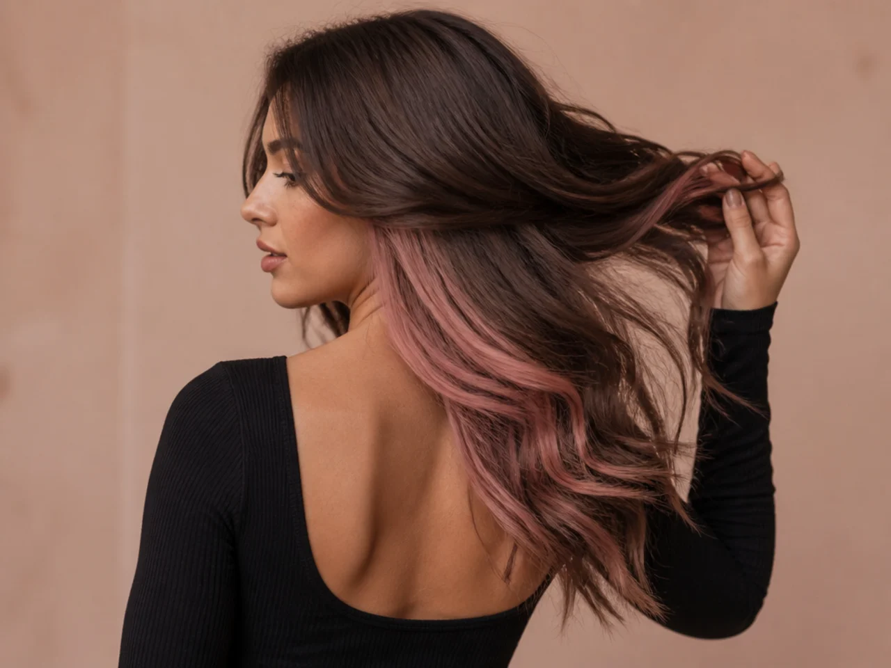 A rose gold panel on brunette hair