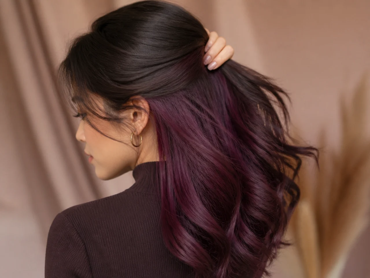 Warm purple pulling burgundy on an under-lifted base