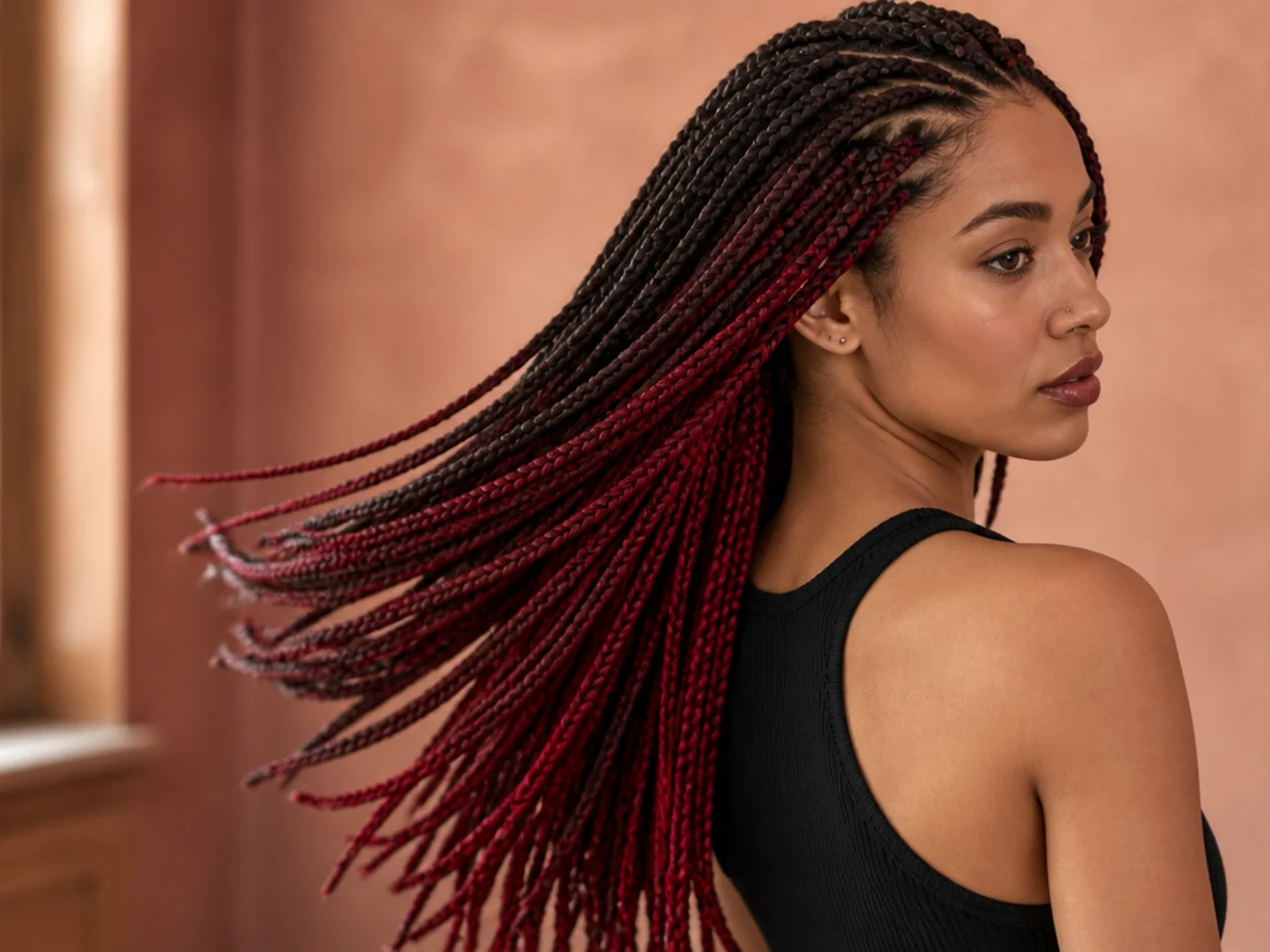 Red extension hair added to braids