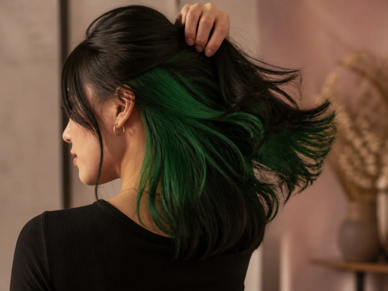 Emerald panel under black hair