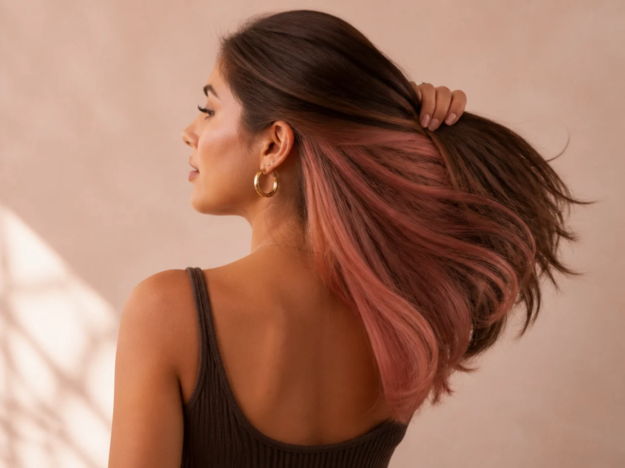 Rose gold panel under brown hair