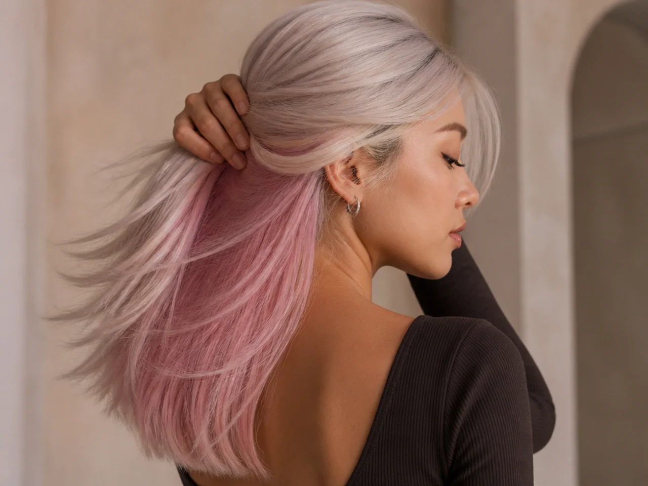 Pastel pink panel under platinum hair