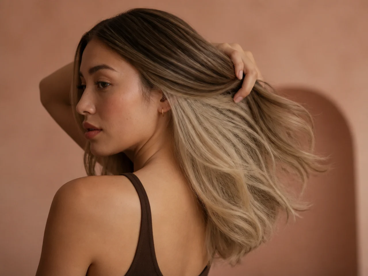 A wheat panel under dark blonde hair