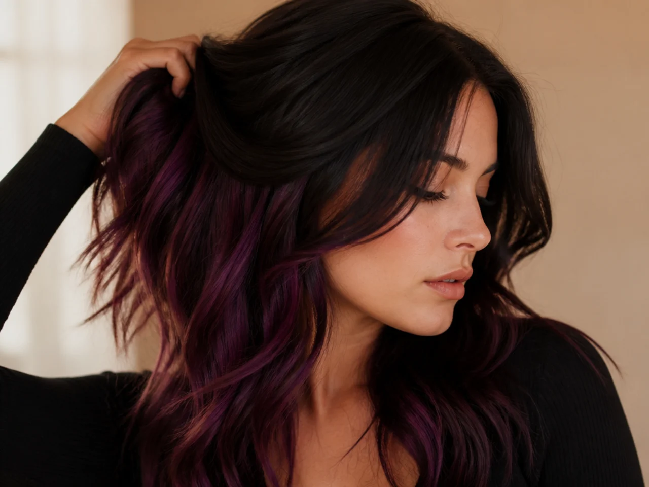 A plum coloured underlayer on dark hair