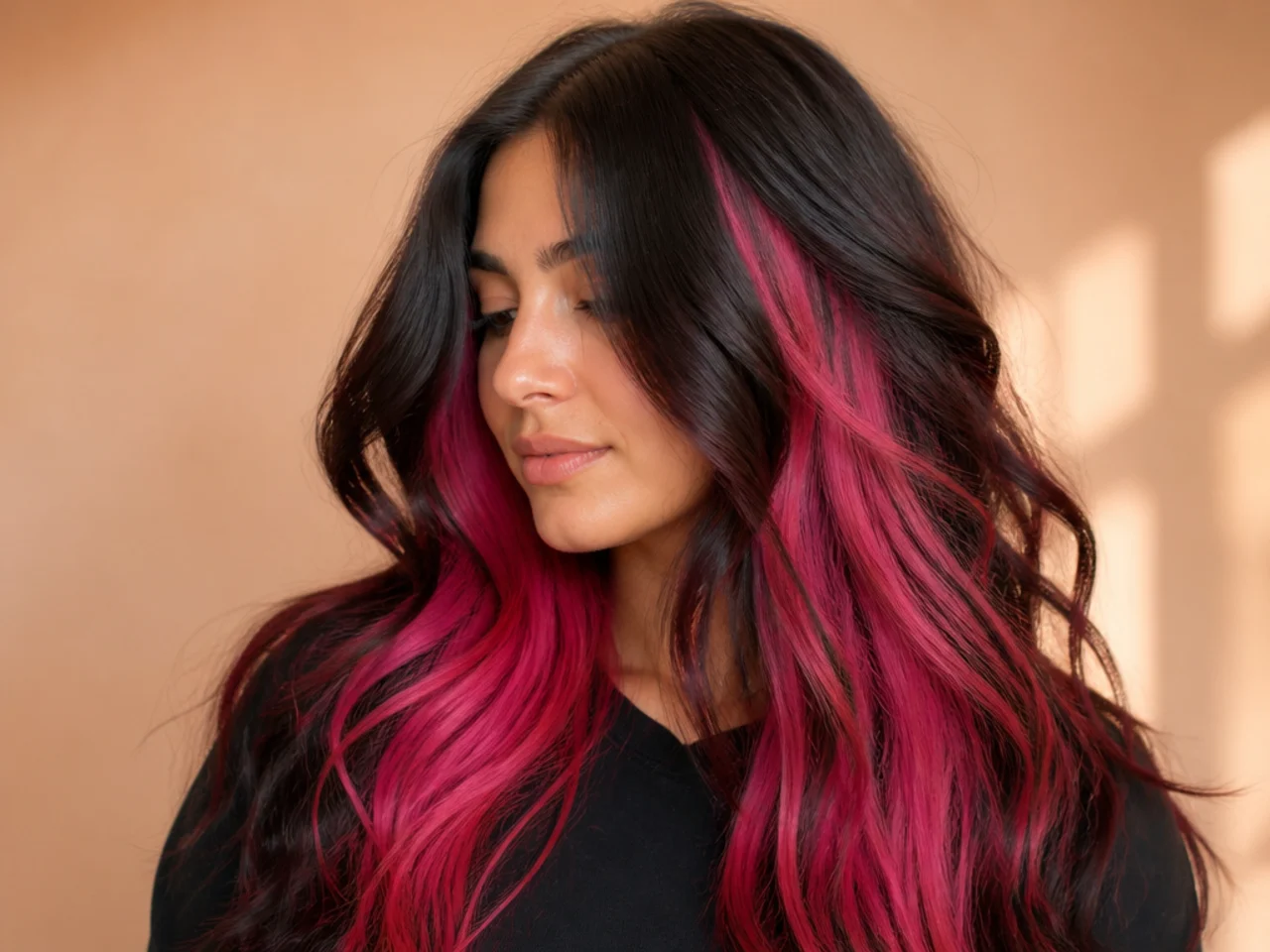 A hot pink panel under dark hair