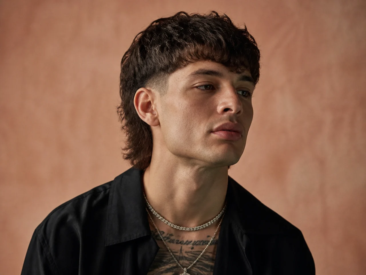 From Mullet to Modern: Peso Pluma's Hair Journey