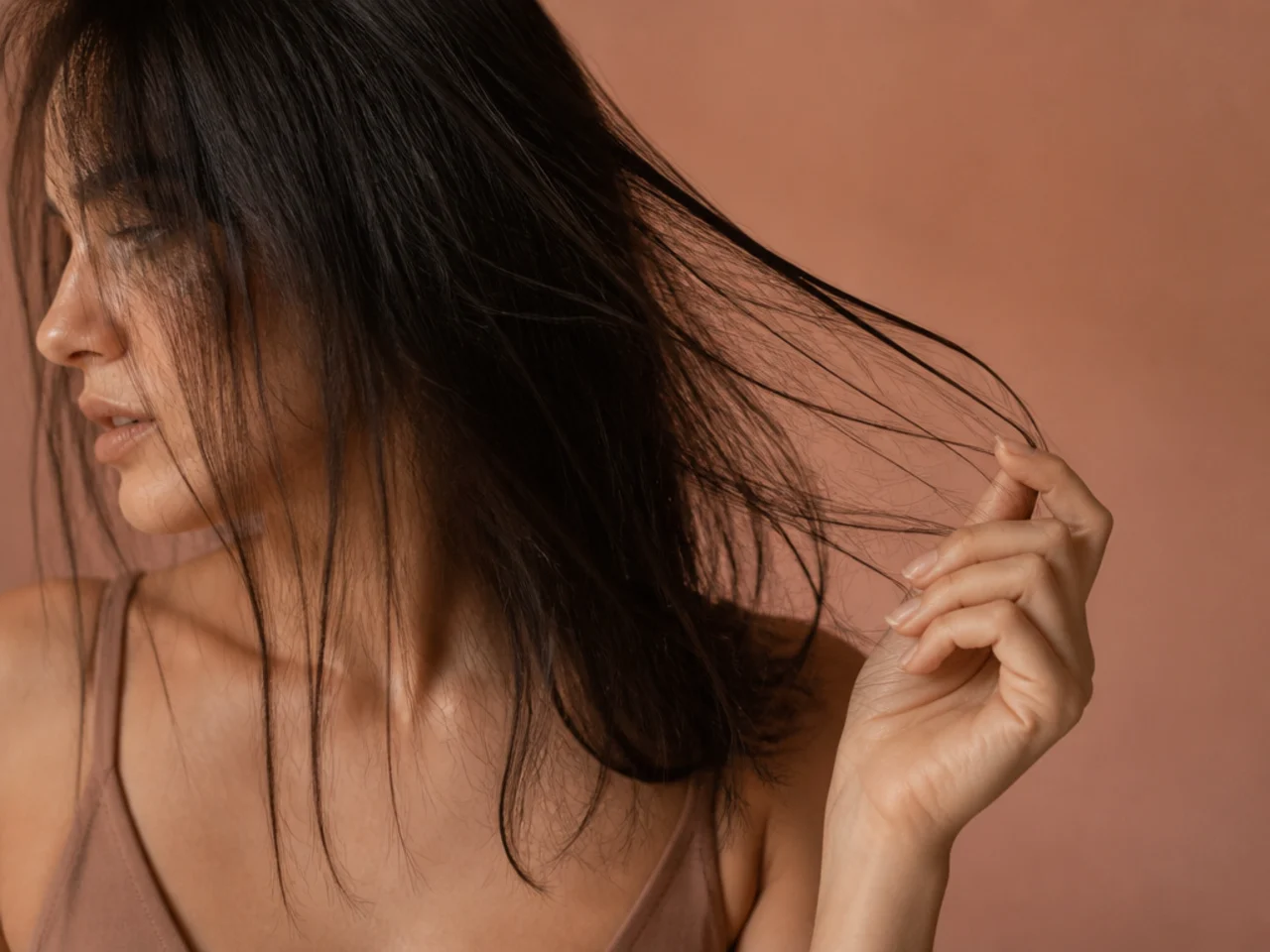 Fine hair with over thinned stringy ends and a broken outline