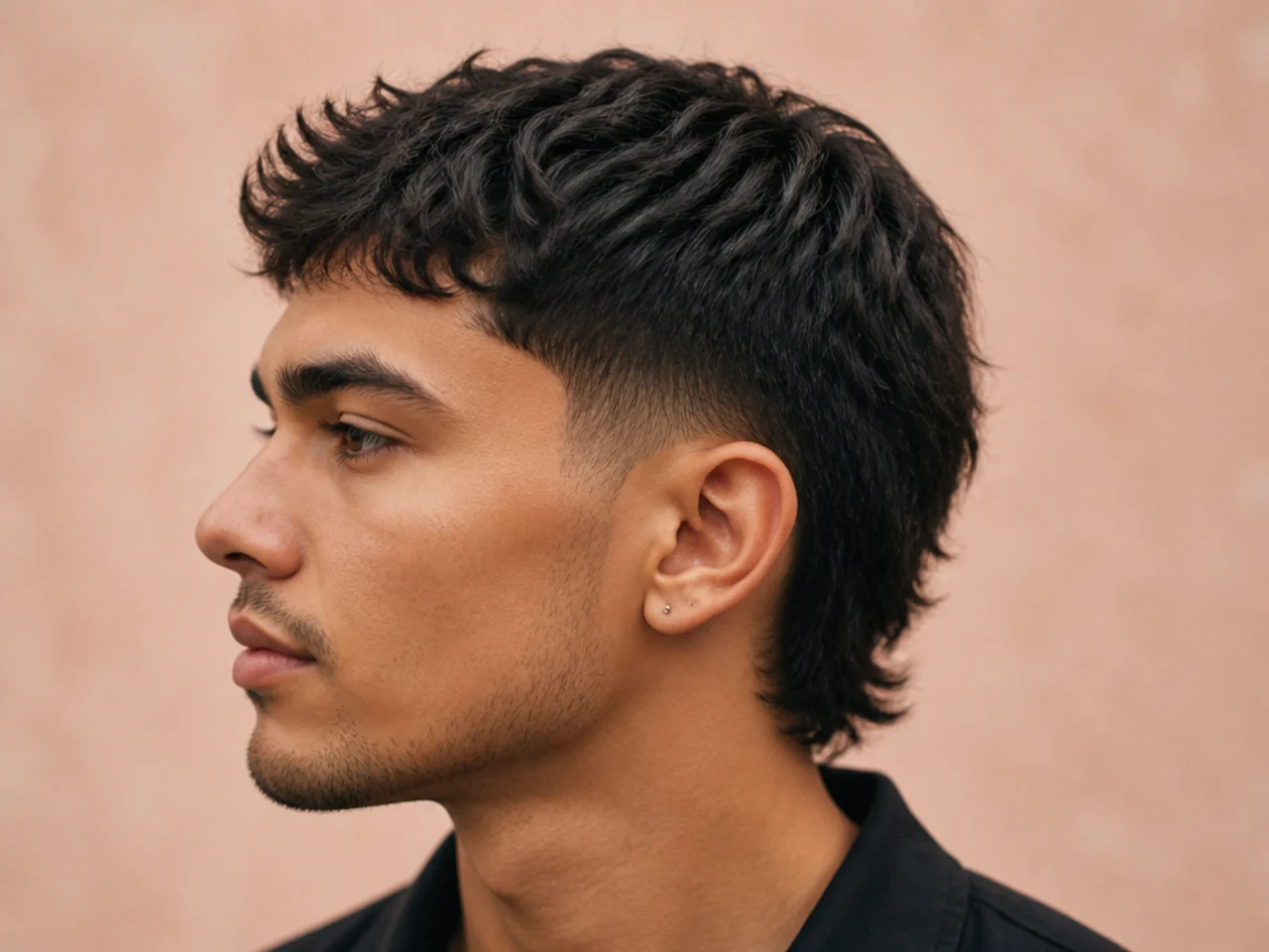Taper short mullet with scissor-graded sides and textured two-inch top