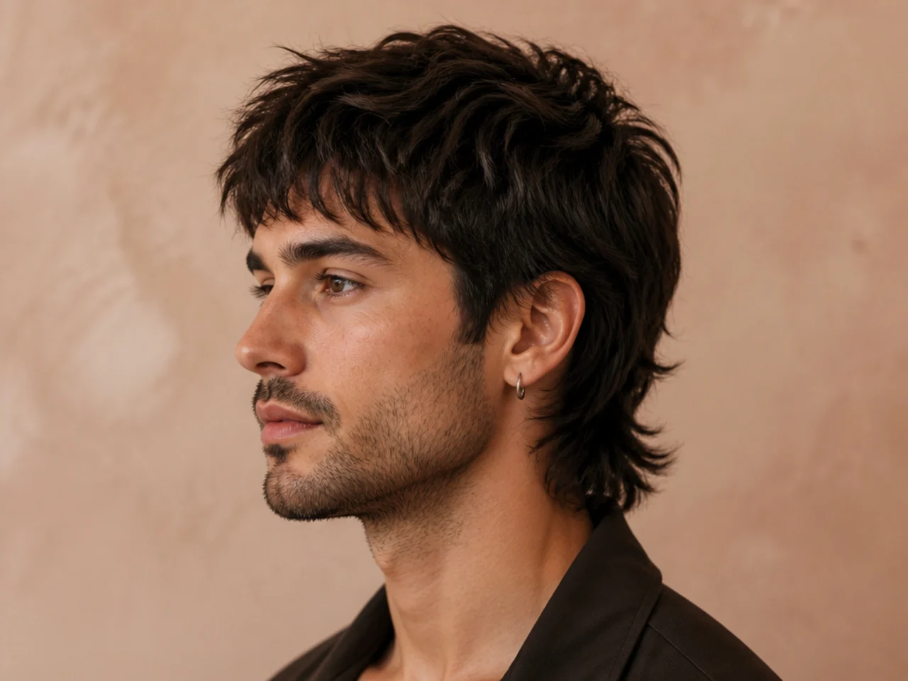 Soft mullet with soft textured fringe falling piecey to the brow