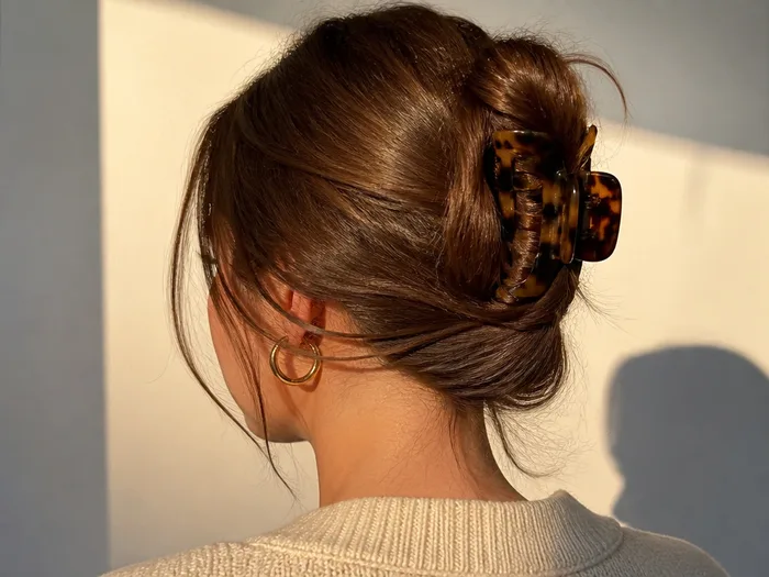 Claw-clip twist Thanksgiving hairstyle with tortoiseshell clip
