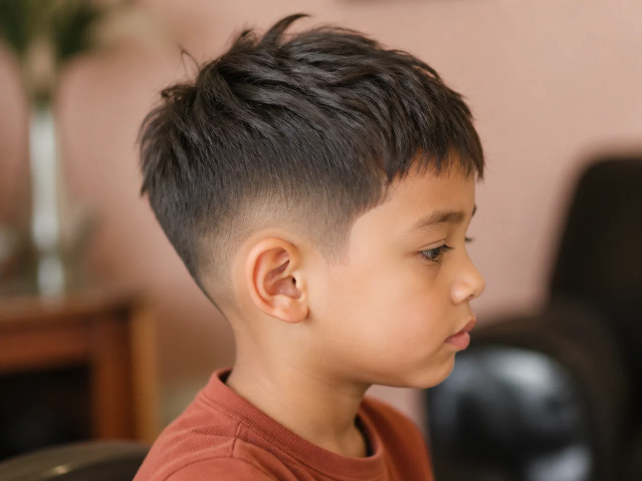 A toddler boy with a textured crop and scissor-cut sides