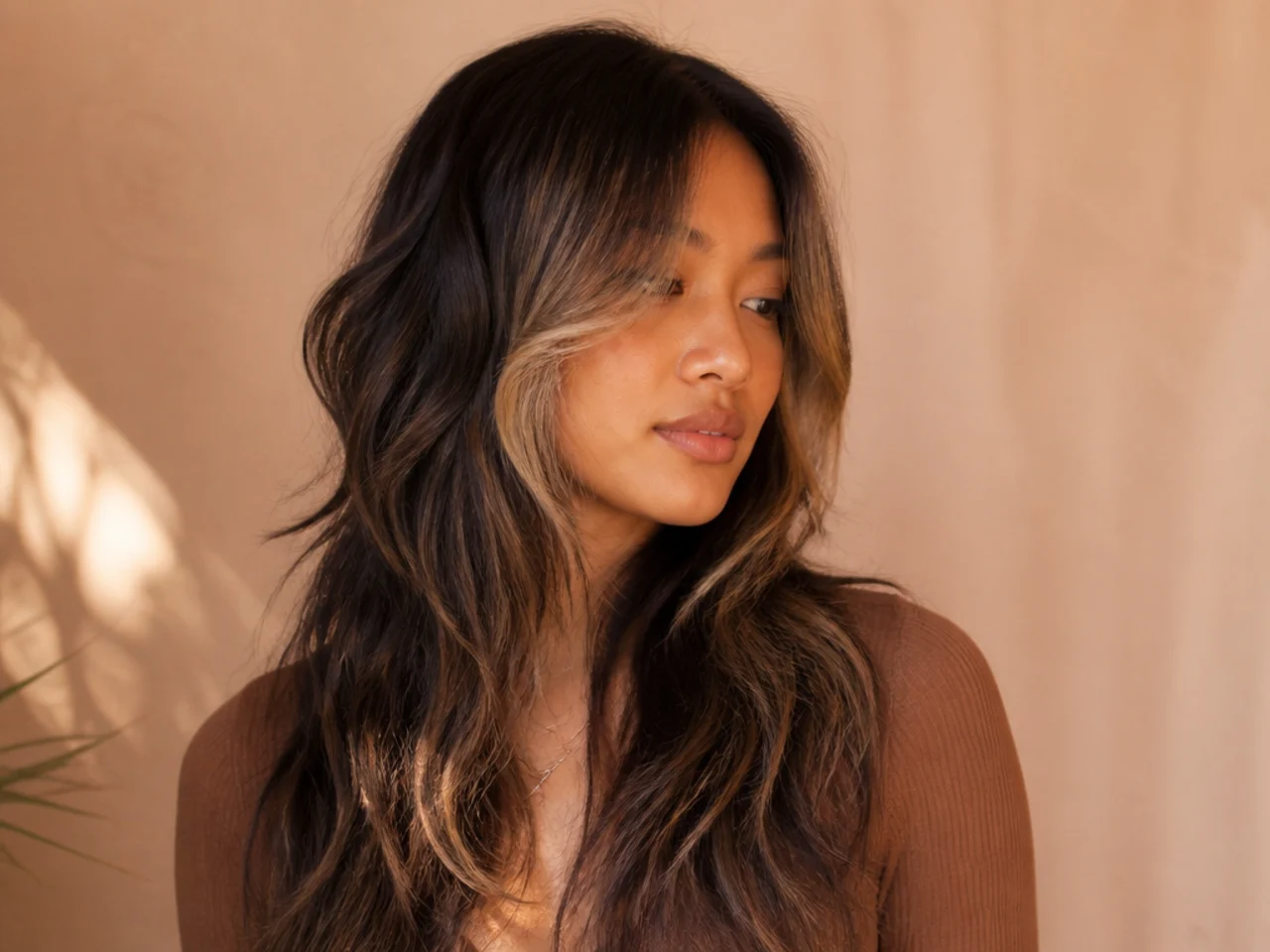 A long wavy wolf cut with lightened front sections