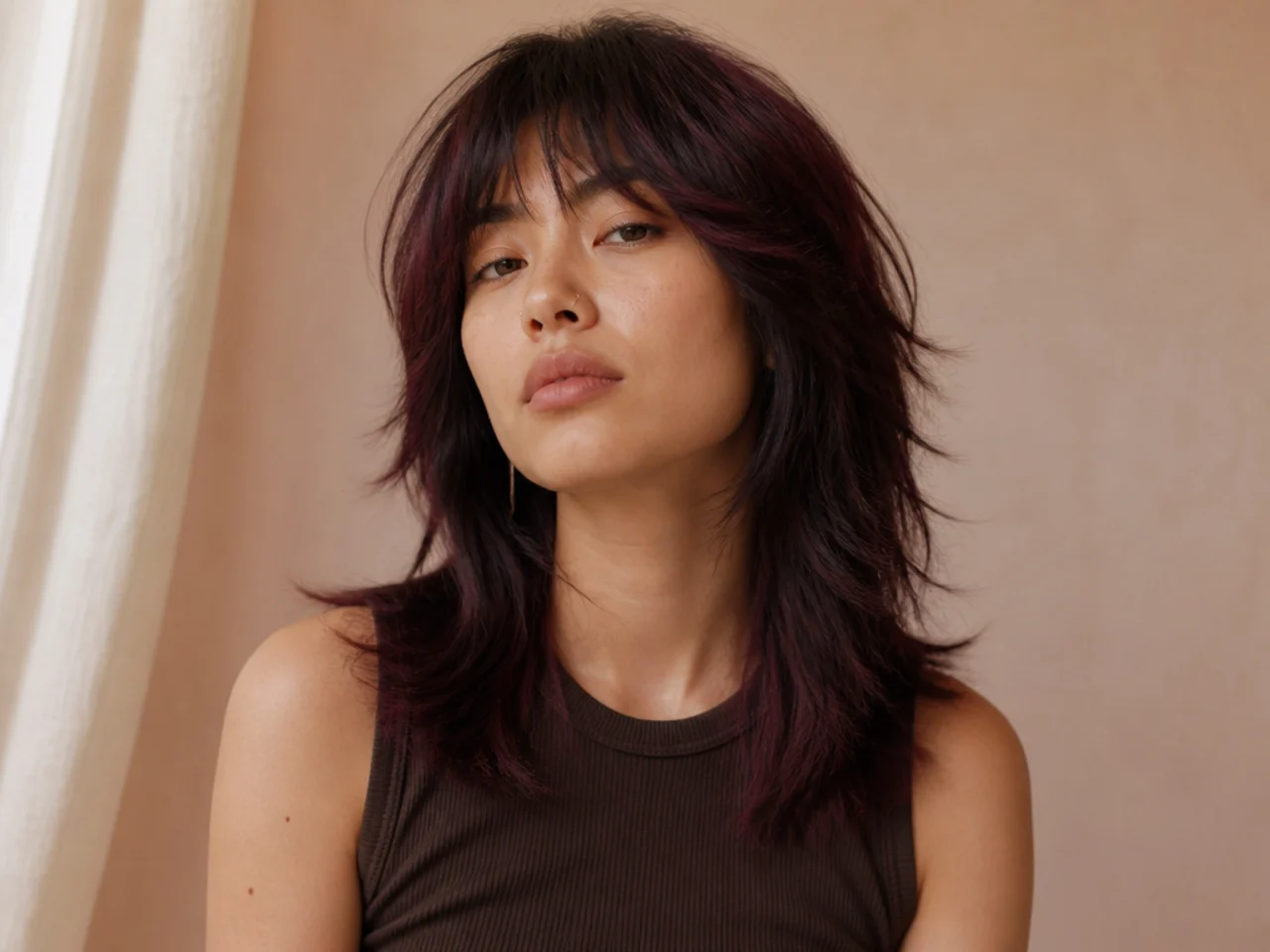 Wolf cut on colour-treated hair with blunter layering