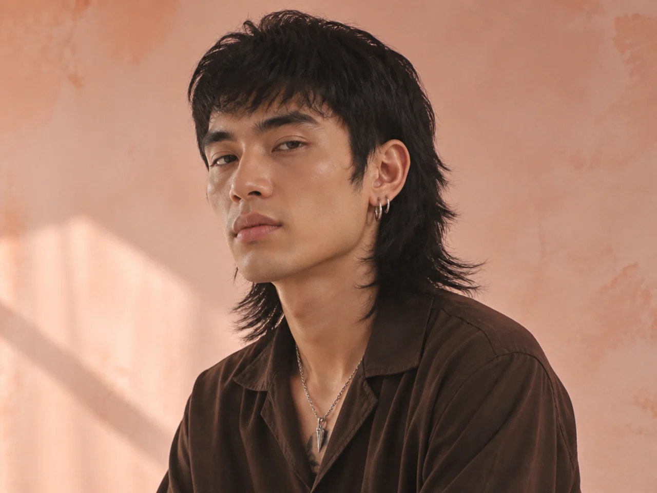 Mullet on straight thick hair with a crisp disconnection