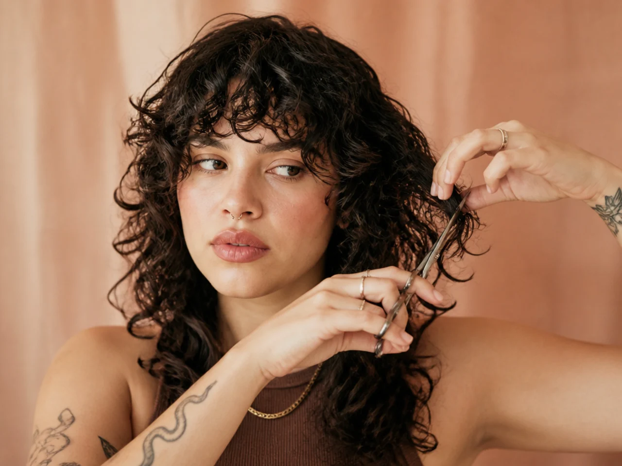 Individual dry curls being trimmed one at a time