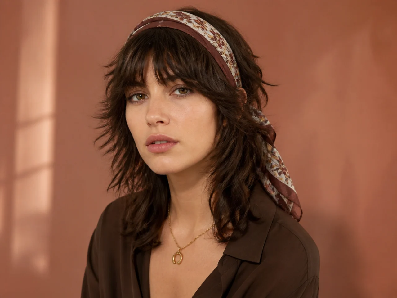 A scarf tied behind released wolf cut bangs