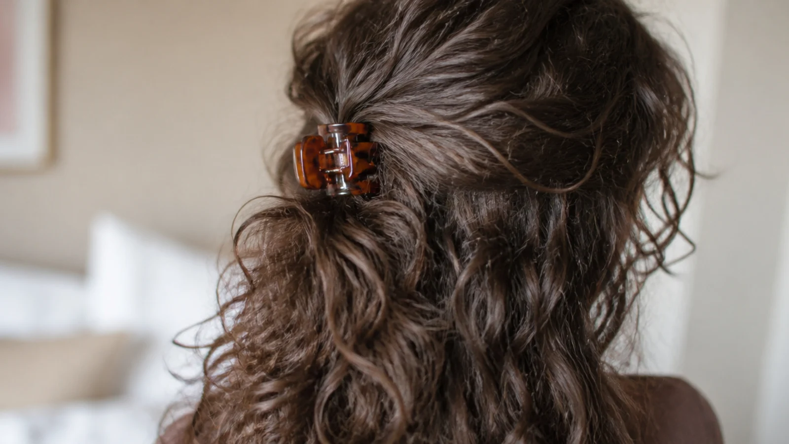 Curls worn half up on the second day with a soft crown