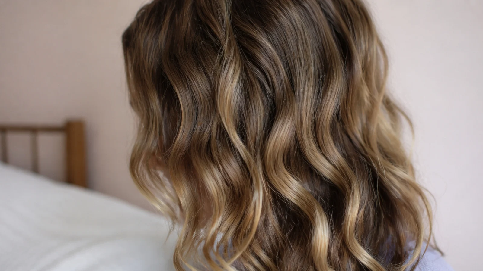 Soft waves formed after drying hair wrapped in a cotton shirt