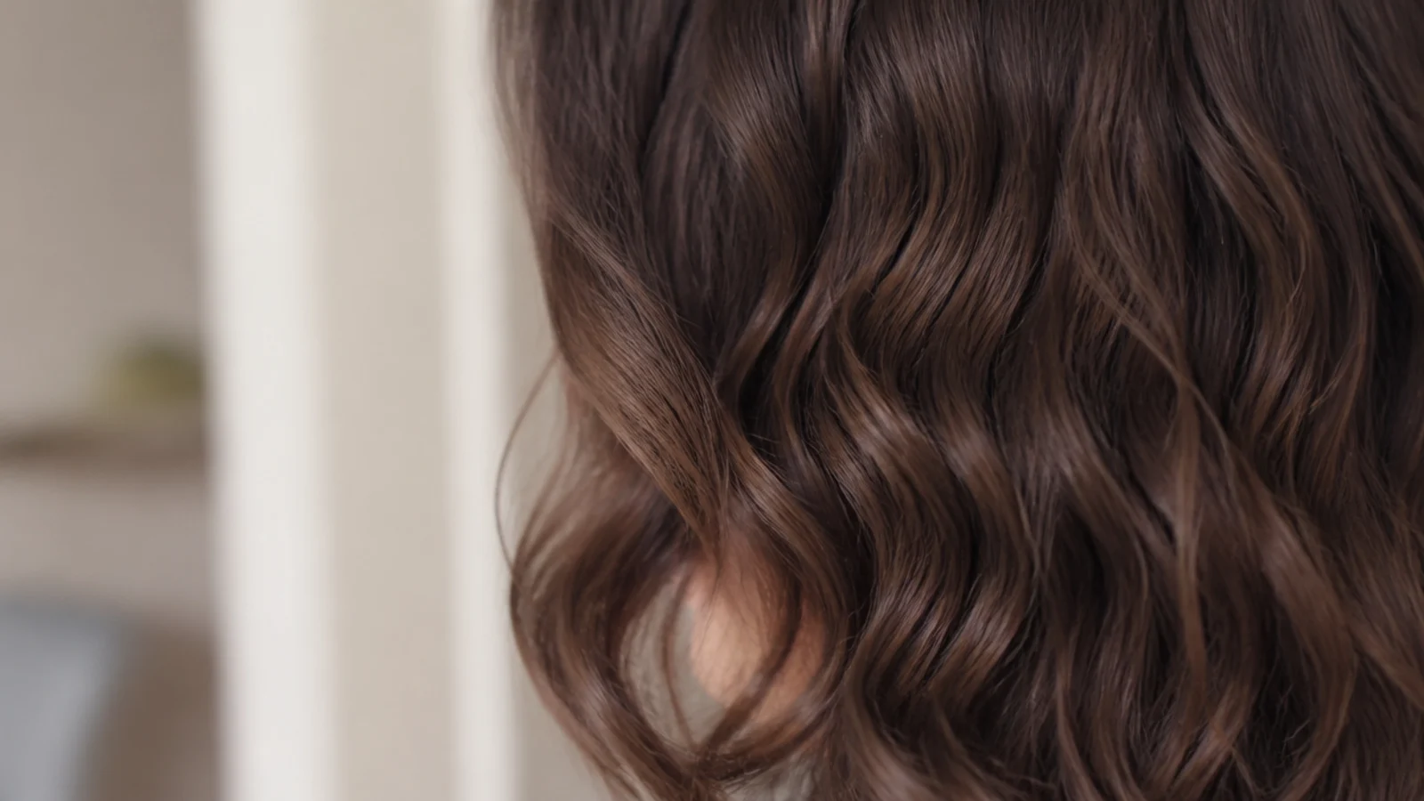 Soft loose waves air drying with visible lift at the crown