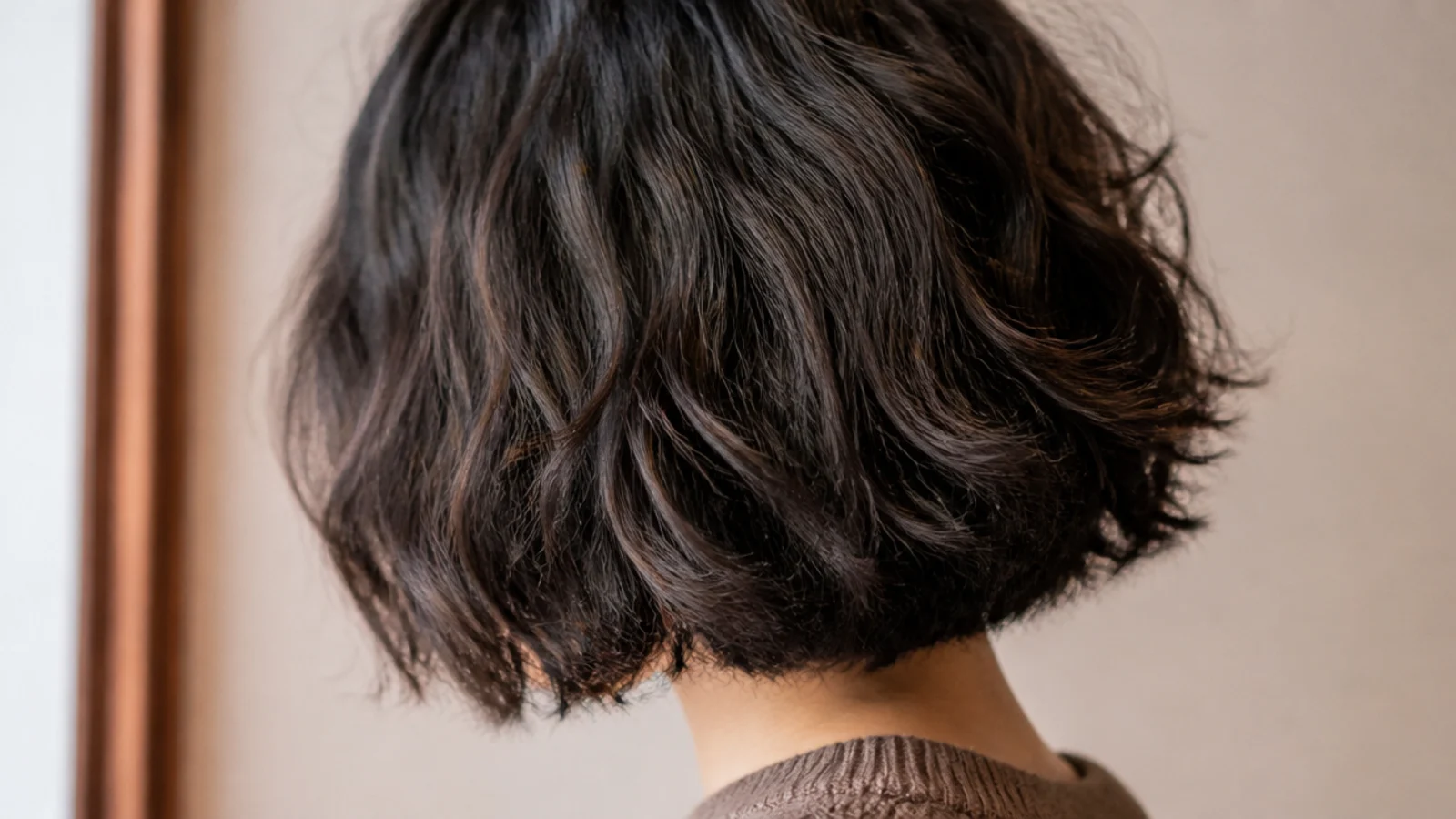 A jaw length bob viewed from the side showing a clean outer line