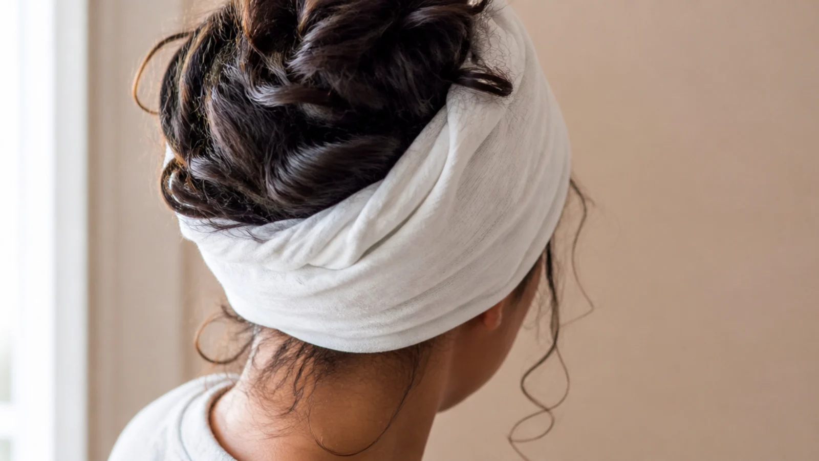 Defined curls after being plopped, sitting close to the head with visible spring