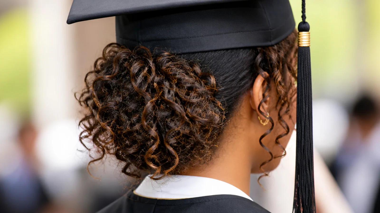 Natural curls pinned up loosely with the pattern still visible