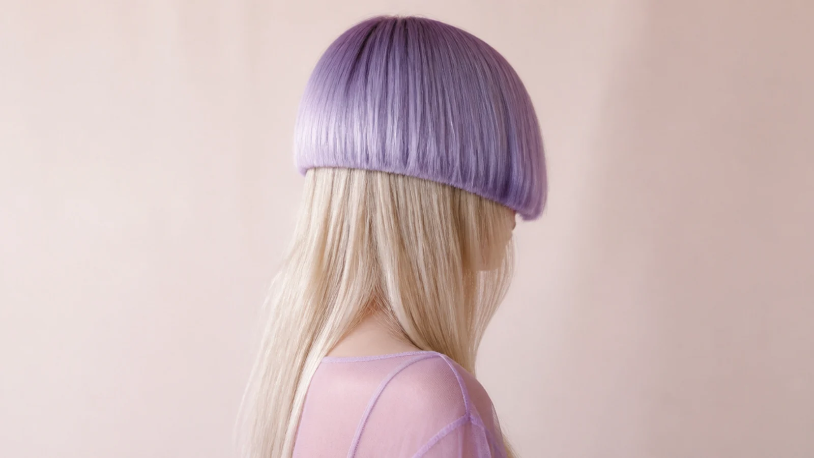 Soft lilac hair in a stepped two length shape under even daylight