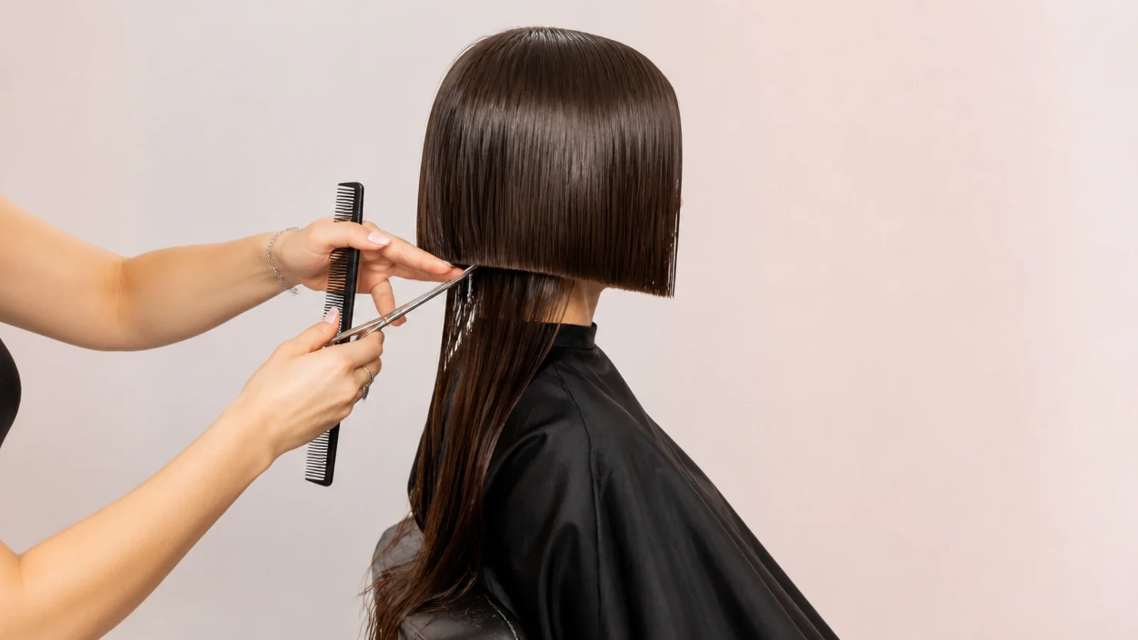The front of the top section combed forward and cut level across the face