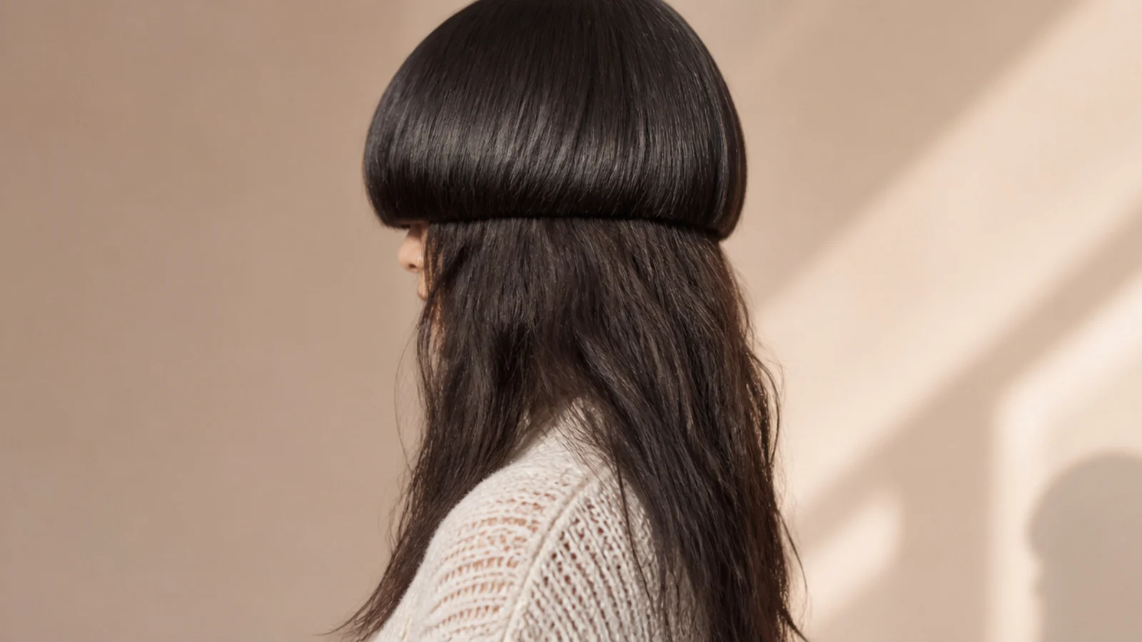 Thick dense hair in a stepped medium length cut