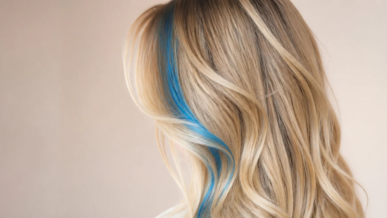A single broad blue streak running down one side of the face