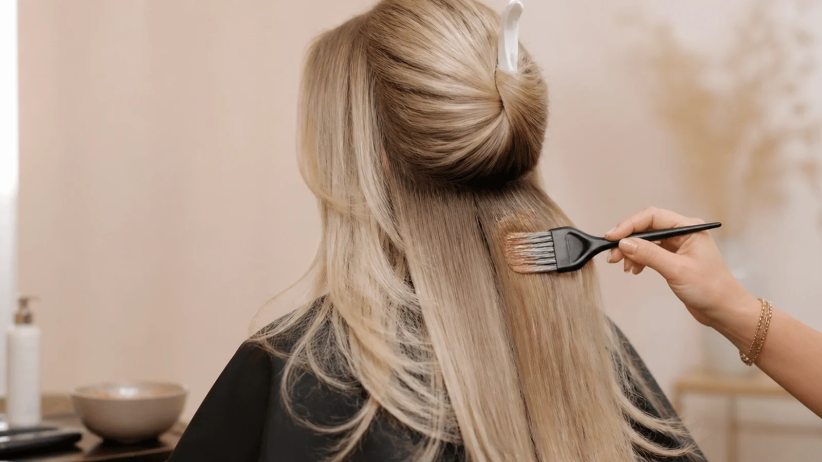 Bleached blonde lengths part way through being taken back to brown