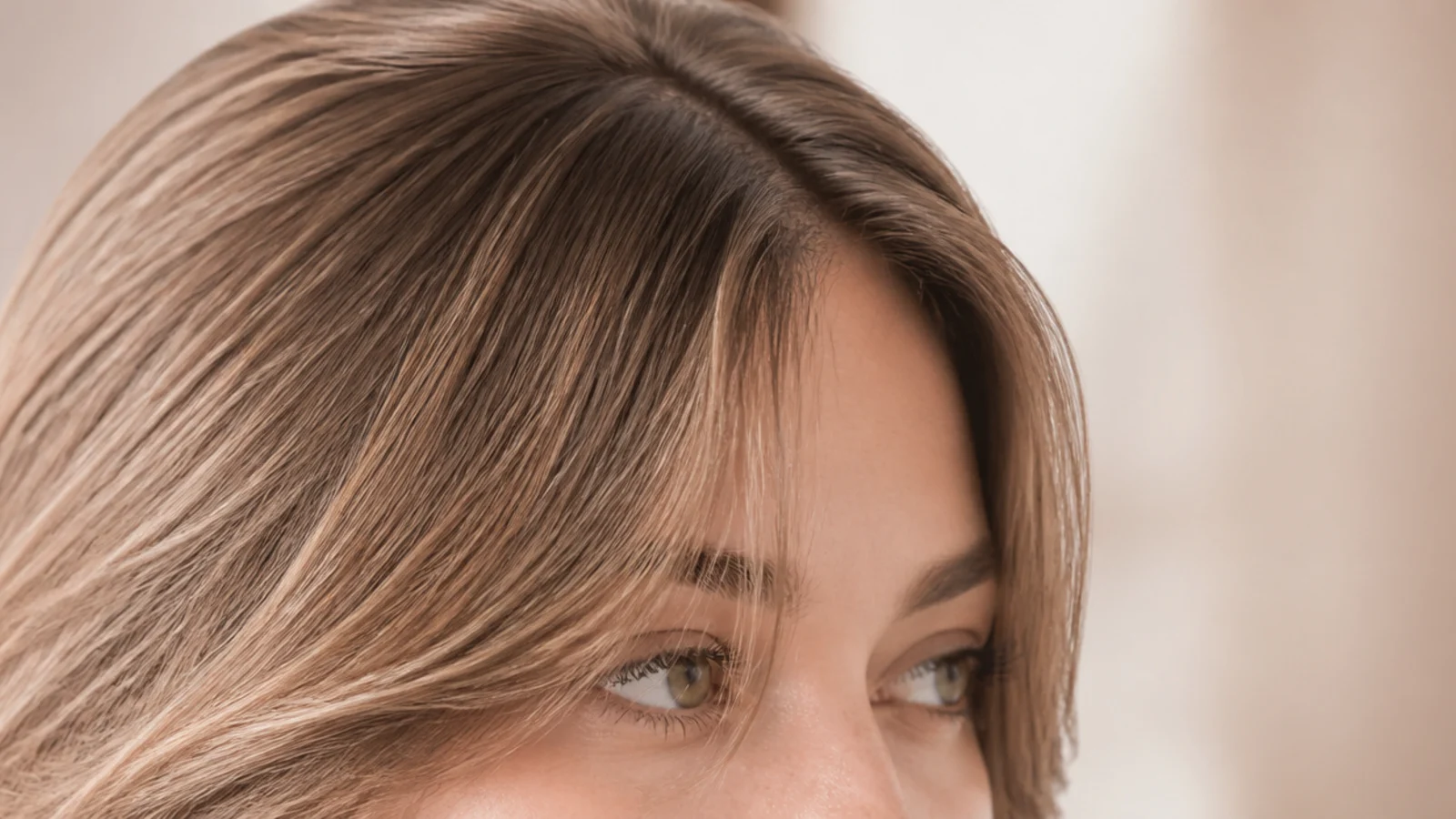 A light wispy fringe separating into fine pieces across the forehead