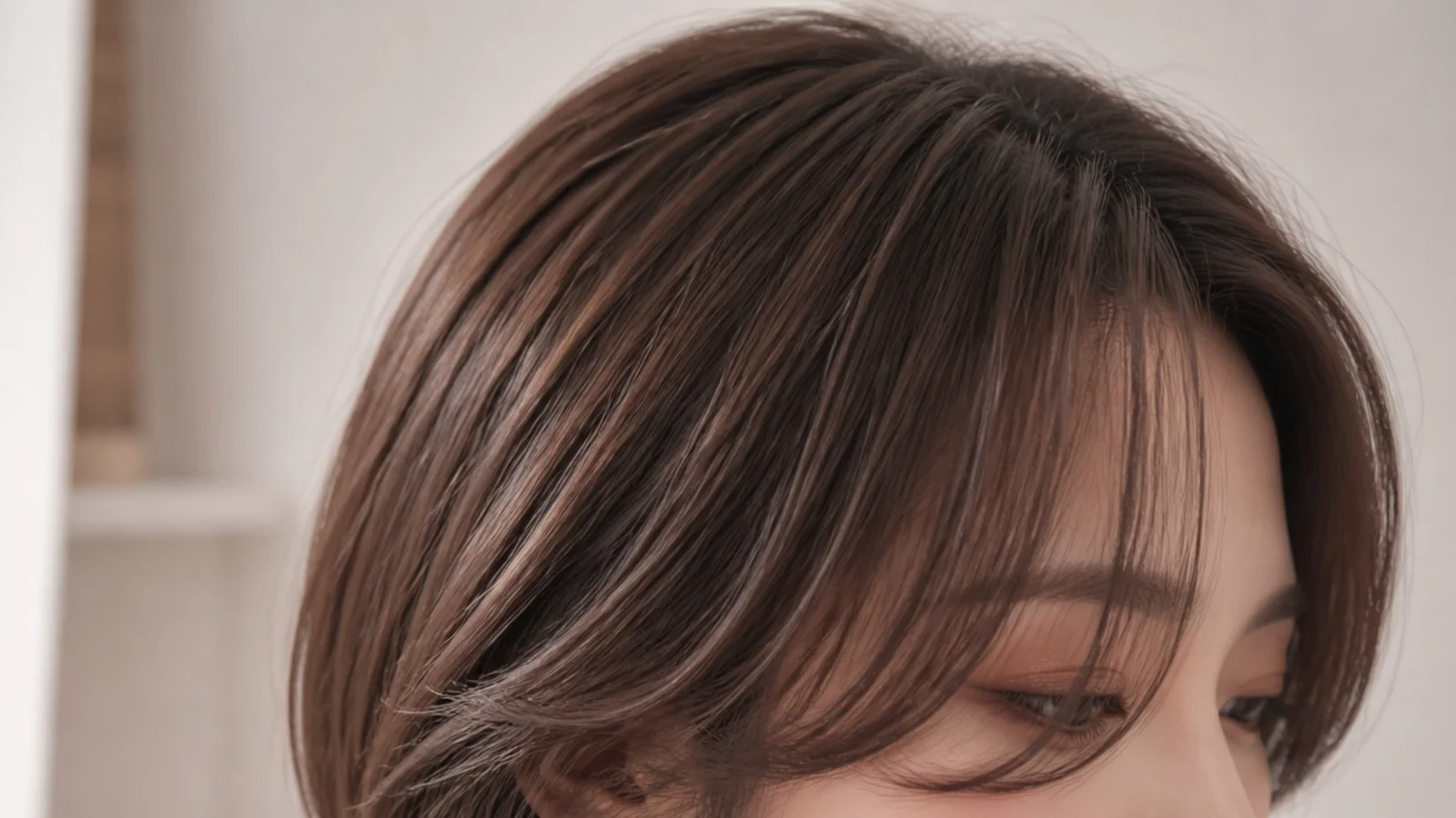 An airy layered hush cut with a light fringe blending into the layers