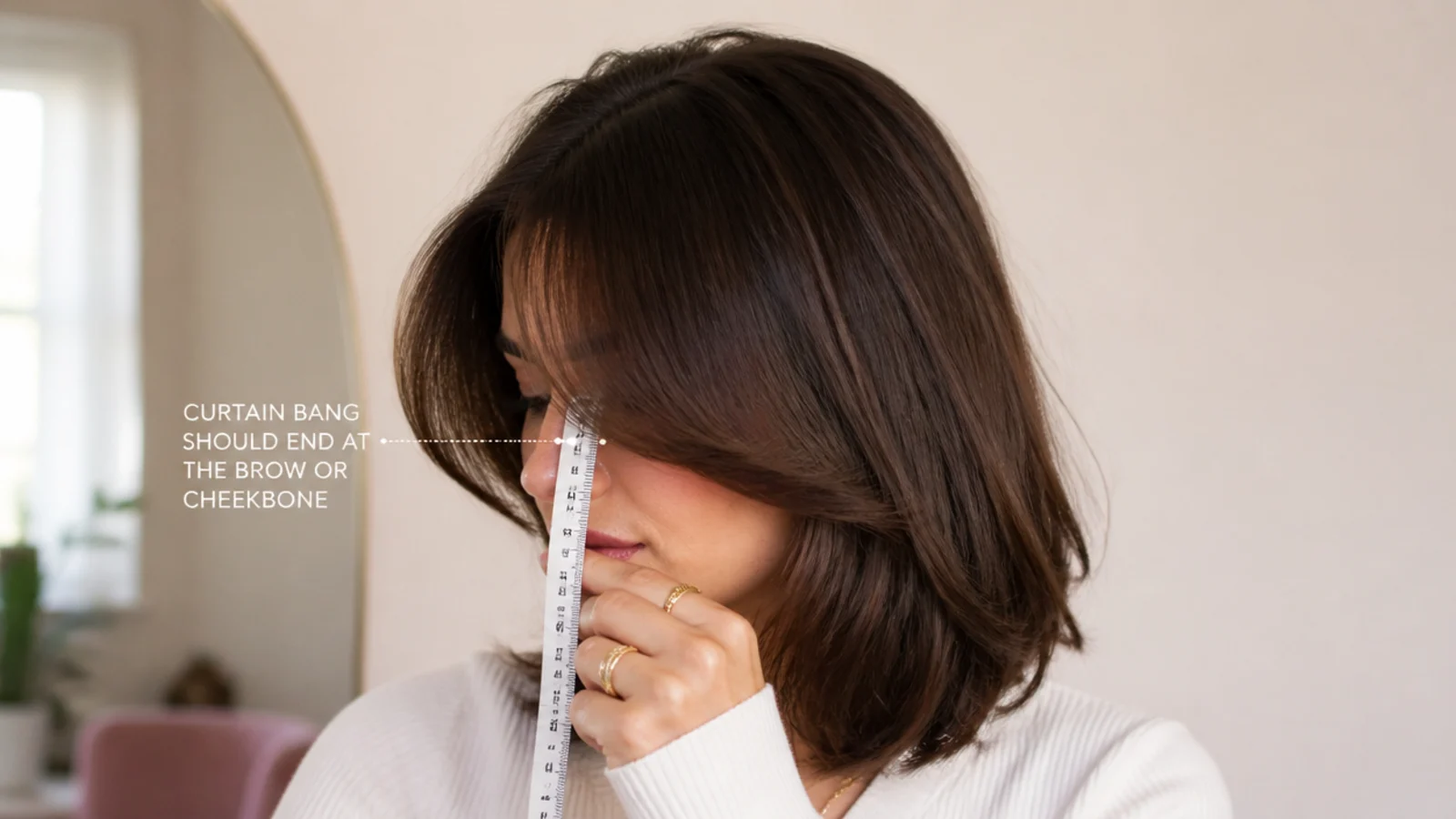 A very short fringe sitting clear above the eyebrows