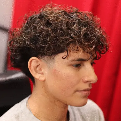 10. Blowout Taper Fade for Curly Hair