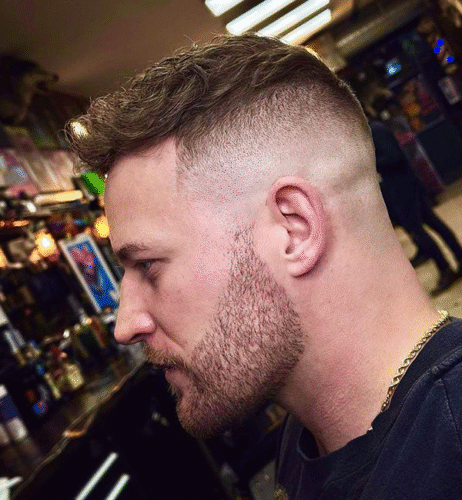 Short Messy Waves with High Skin Fade