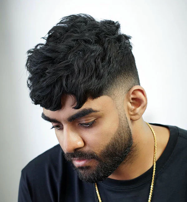 Thick, Messy Crop with Low Taper Fade 