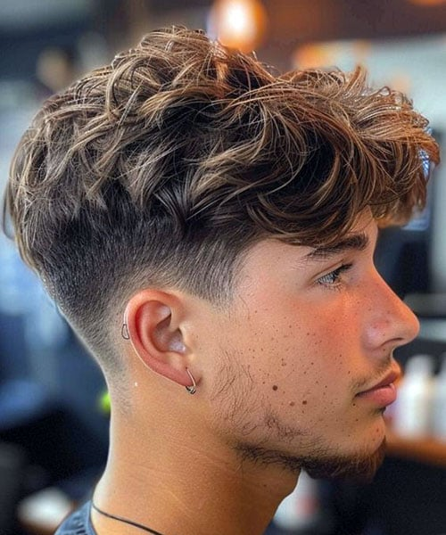 Classy Low Taper Fade with Longer Hair on Top