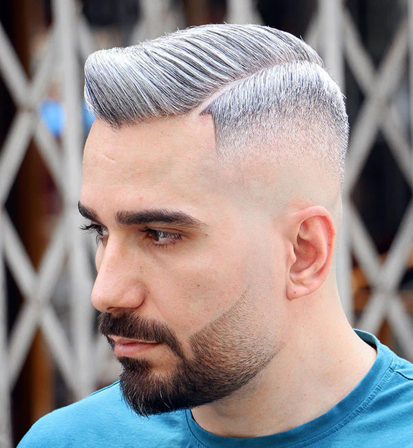 Side Part Skin Fade with Thick Hard Part and Blended Beard