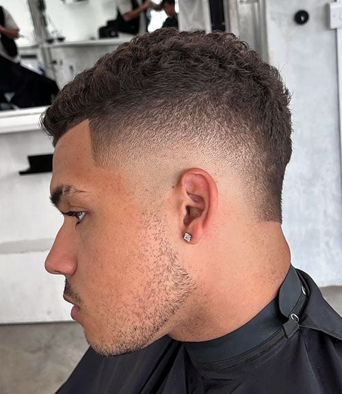 Edgy Short Mohawk with Clean Low Burst Fade