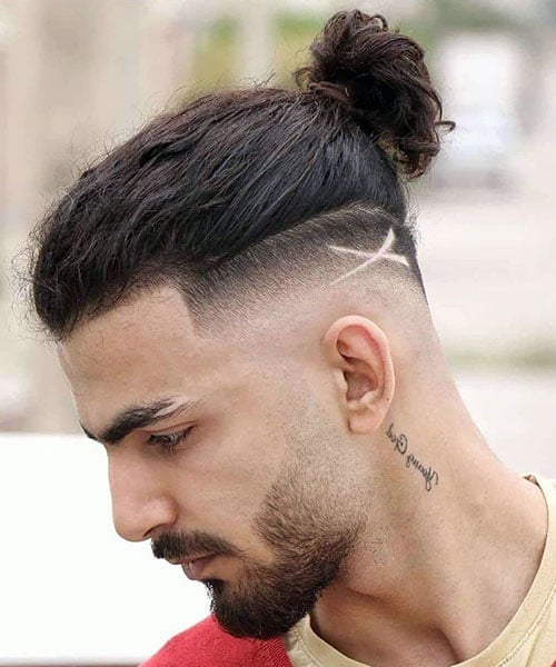 Fresh Mid Undercut Fade with Cool Design
