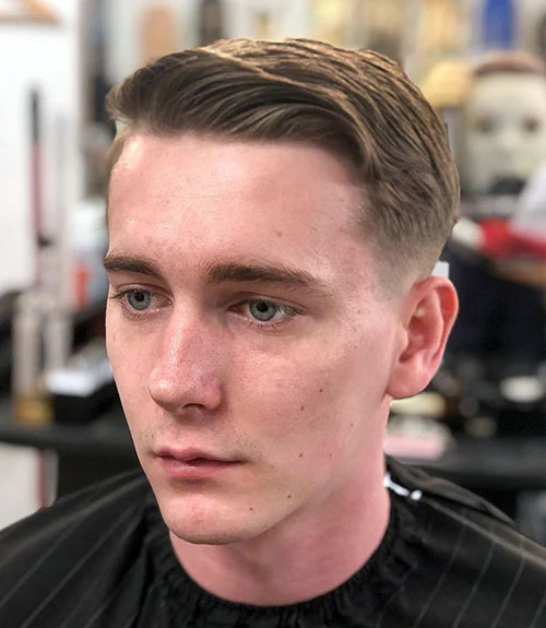 Side Swept Ivy League with Low Taper Fade