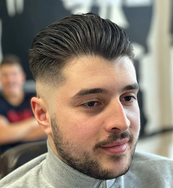 Slick Back with Mid Skin Fade