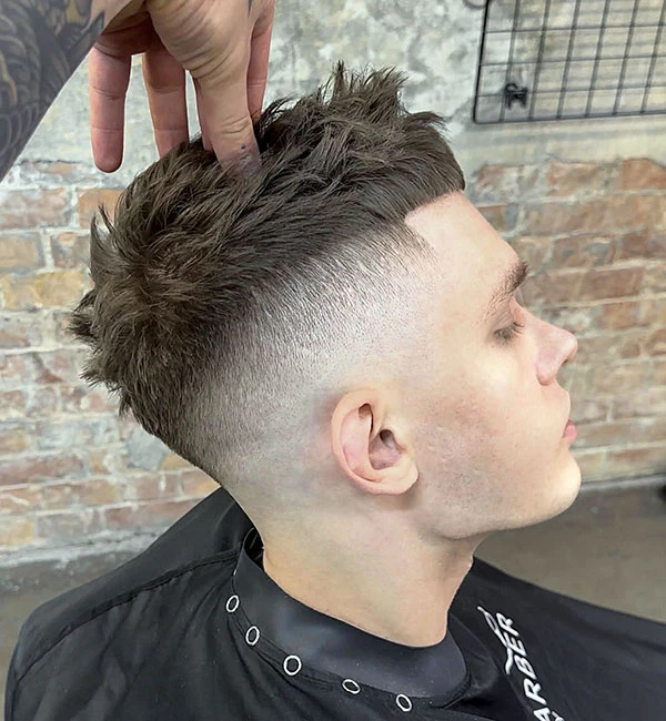 Short Messy Spikes with Mid Skin Fade