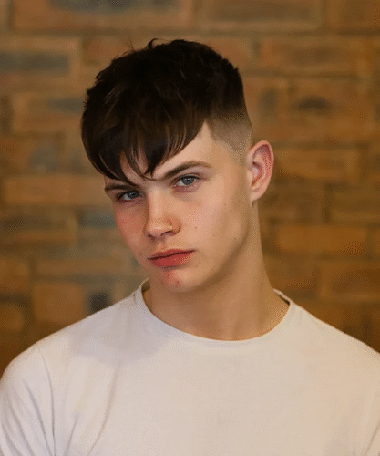 Heavy angular fringe with thick textured bangs and clean sides