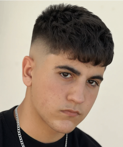 Fringe with fade haircut featuring sharp edges and structured fringe