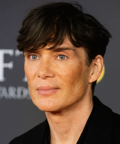 Floppy fringe haircut with long, relaxed bangs and layered flow