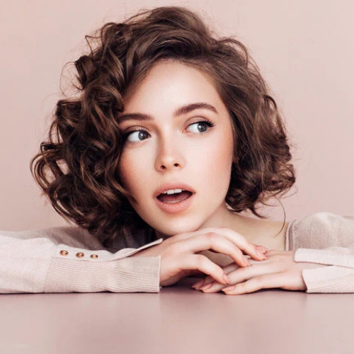 Curly Asymmetrical Bob