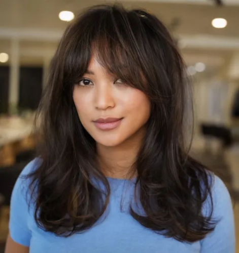 10. Chocolate Brown with Face-Framing Highlights